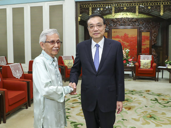 中南海紫光阁李总理总理会见马来西亚总理特使、元老理事会牵头人达因